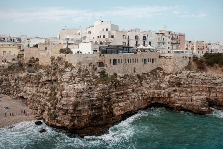 Italian cliffside view of bari italy with white buildings