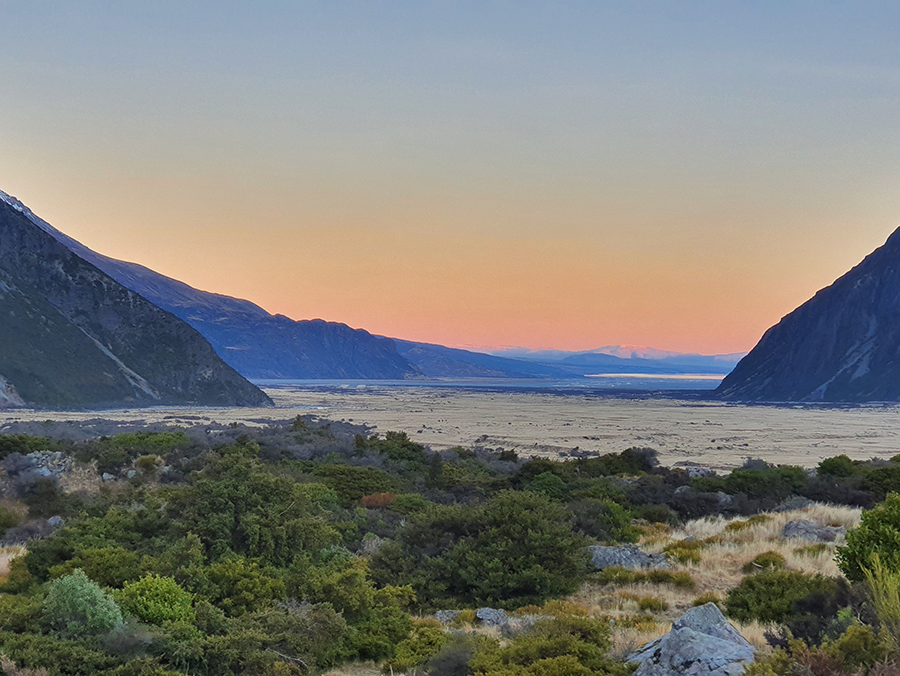 dawn shaded skies overlooking mount cook, new zealand