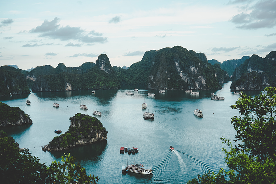 photo of vietnam, hạ long, island and boats in Hạ Long, Vietnam